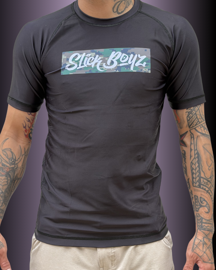 Front view of SlickBoyz rash guard in the color black