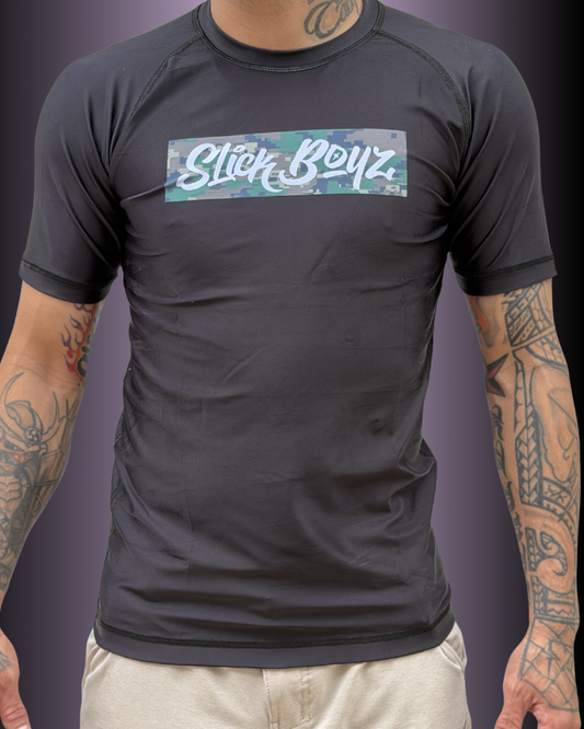 Front view of SlickBoyz rash guard in the color black